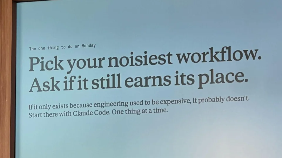 Anthropic のスライド「The one thing to do on Monday: Pick your noisiest workflow. Ask if it still earns its place.」