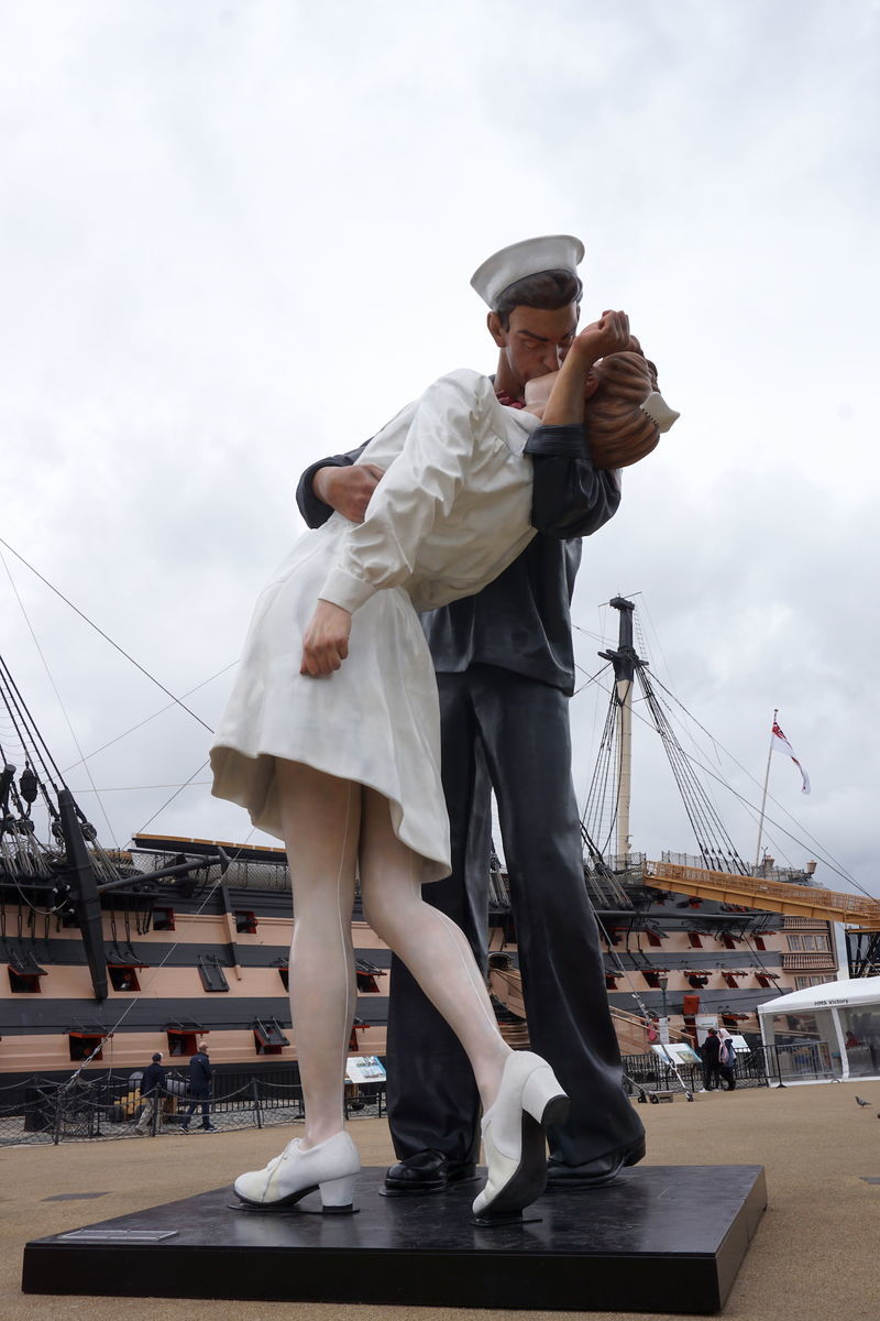 statue in front of HMS Victory