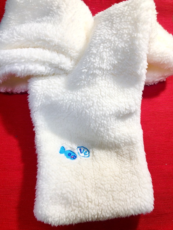 ユウキのイラスト入りマフラーを撮った写真