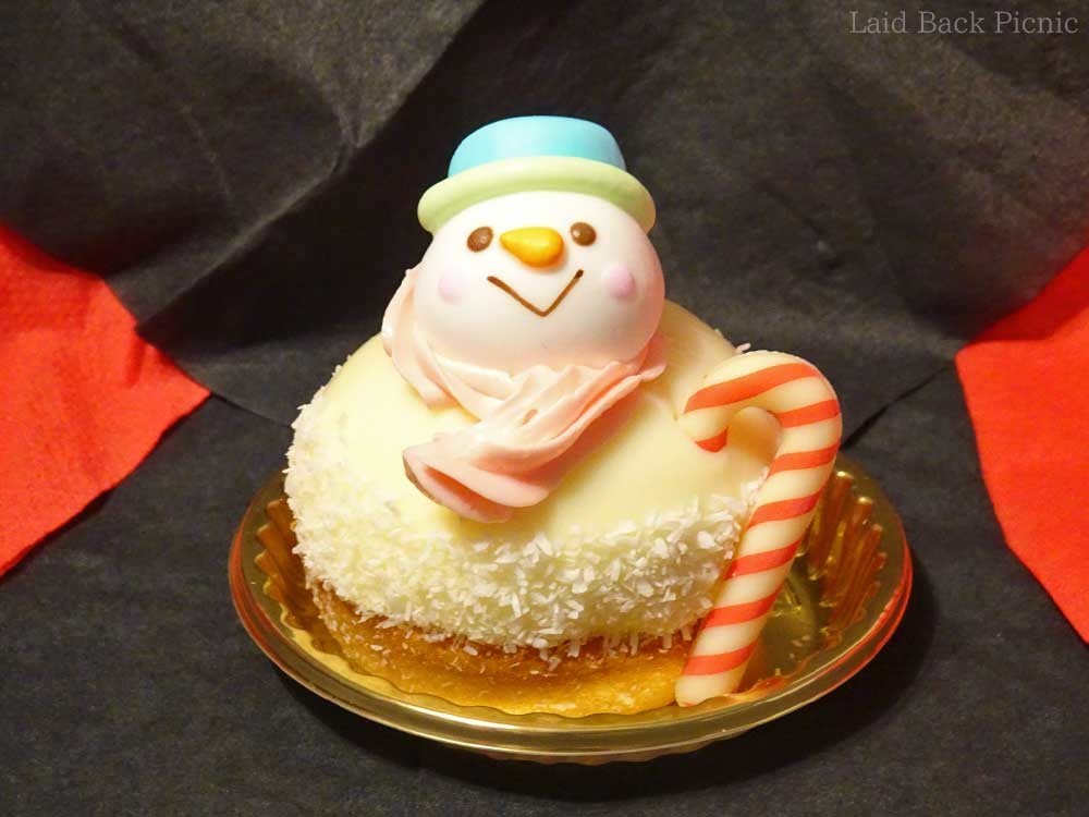 正面:クリスマスステッキを持ったスノーマン