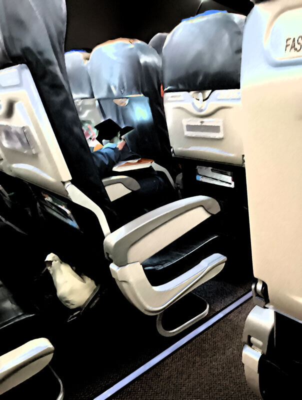 機内で「読経」と思しきお声を長時間拝聴した場面のイメージ