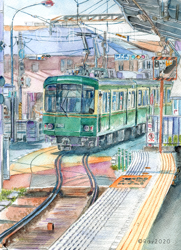 腰越駅を発車する江ノ電