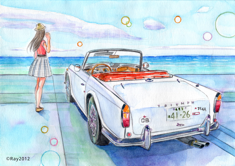 白いオープンカーと海