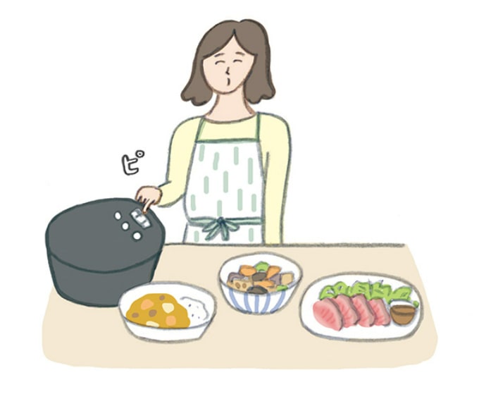 自動調理鍋でさまざまな料理をつくっている女性
