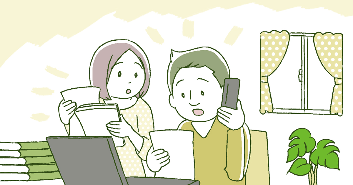 建築会社に打ち合わせの電話を入れる人