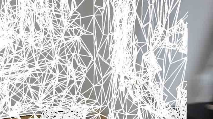 HolographicSpatialMappingアプリで実世界をメッシュ状に表示した例