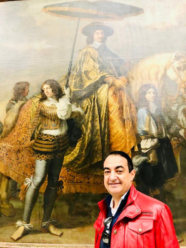 Mohamed Dekkak standing with Charles Le Brun Painting  Paris France #painting #delaroche #travel