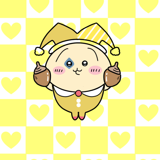 両手にどんぐりを持ちピエロの格好をしているうさぎのイラスト