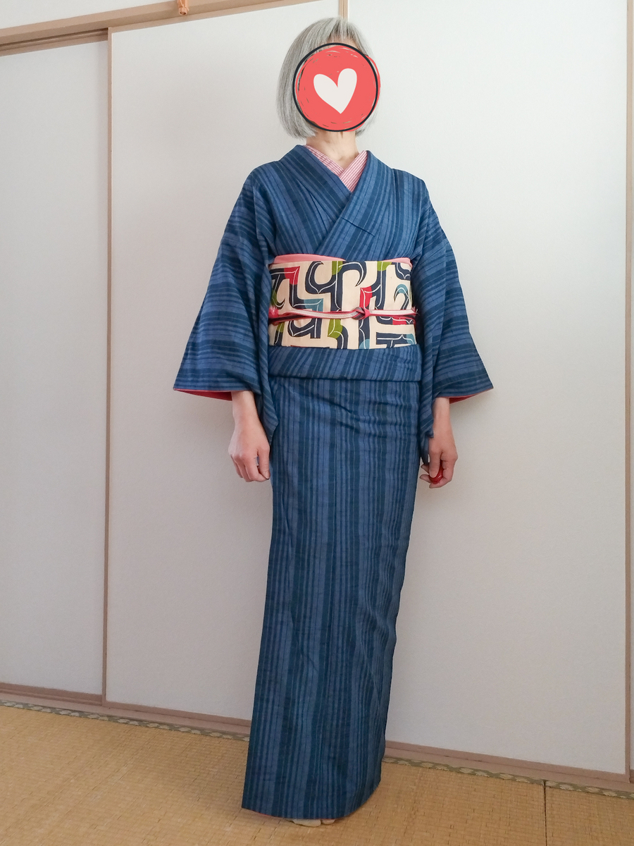 滝縞の節紬にアイヌ文様風の名古屋帯でチョイ桜コーデ - つくしんぼ 