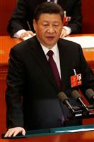 中国の習近平国家主席。中国製造業の「アキレス腱」が見え始めた?=今年3月、北京(ロイター)