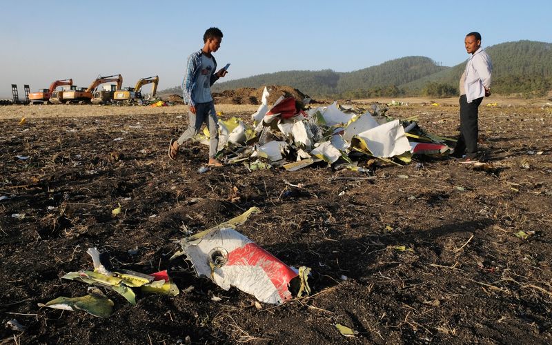 Workers Attend The Crash Site Of Ethiopian Airlines ET302 Flight To Nairobi