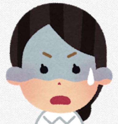 困った表情の女性