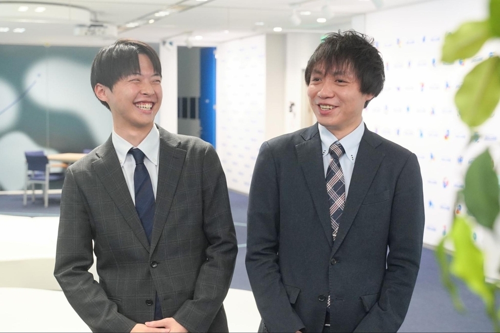代理店営業メンバー2名の写真