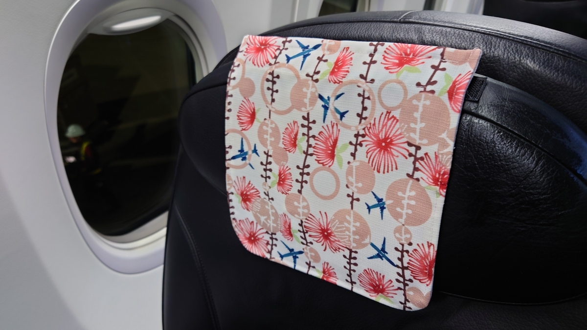 JAL192便 JTA機材のクラスJ座席 沖縄紅型