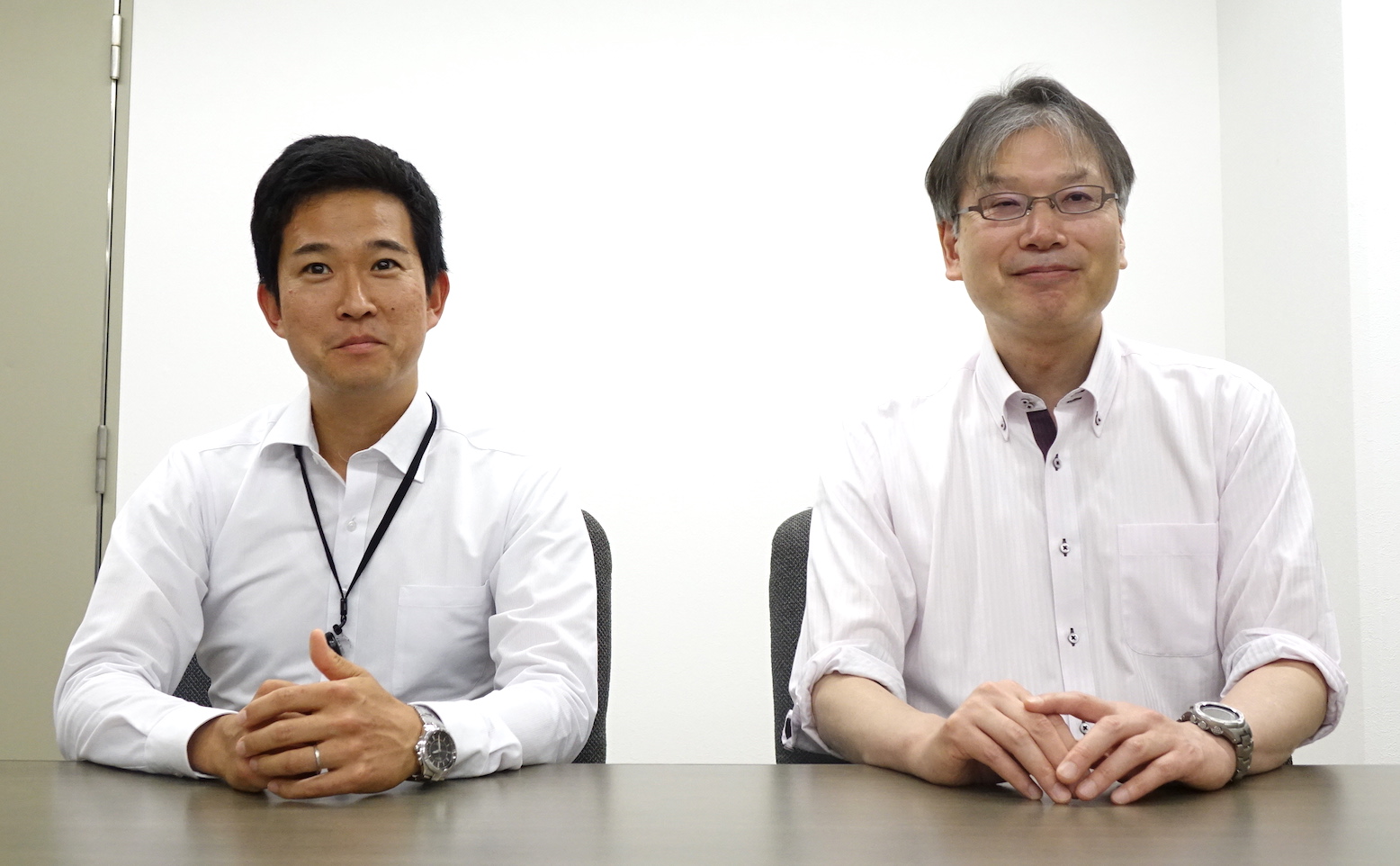 国土地理院基本図情報部地名情報課の大塚孝治さん(写真右)と、地理空間情報部情報普及課の小島脩平さん