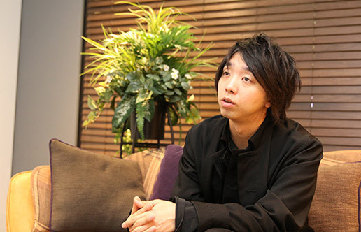 ビジネスのヒントとなるAIの利点について語る落合氏