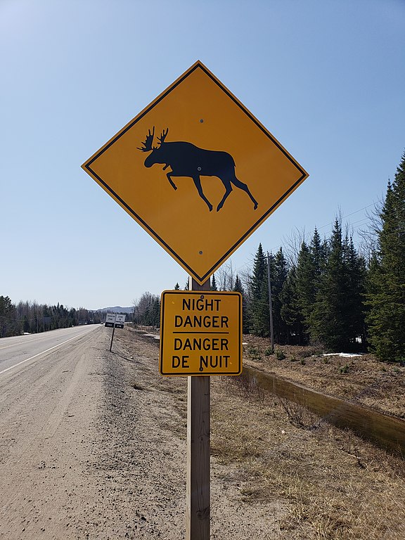 Moose crossing warning sign by Porterhse, (Creative Commons Attribution-Share Alike 3.0 Unported)