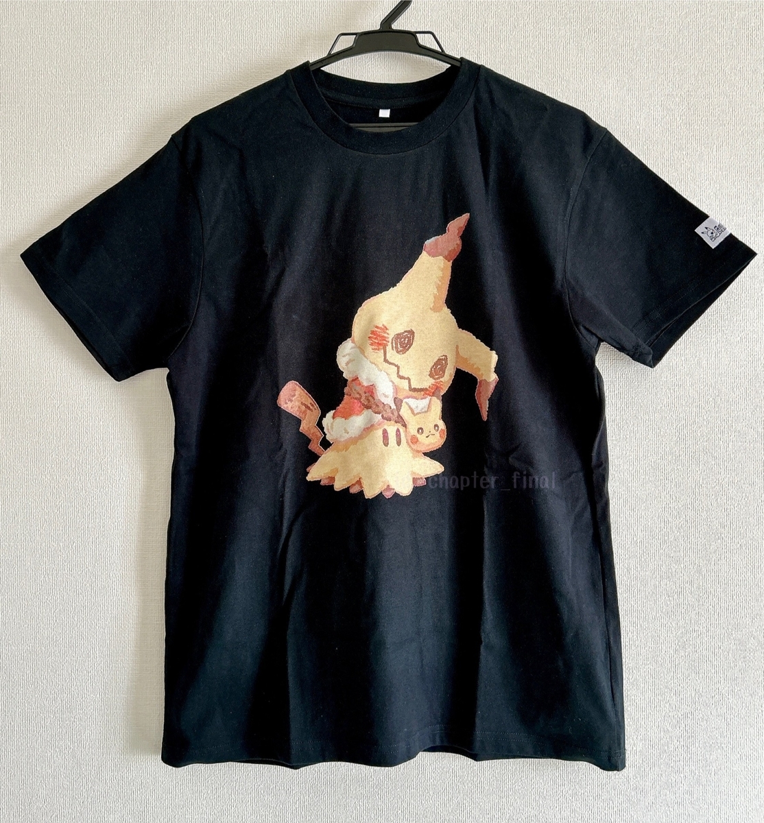 ミミッキュ: ポケモンデザインラボのTシャツ Pokémon Heartwarming