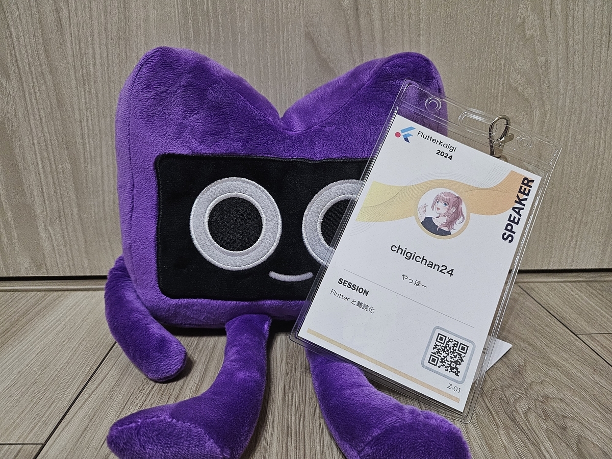 KodeeにFlutterKaigiの名札が添えられている