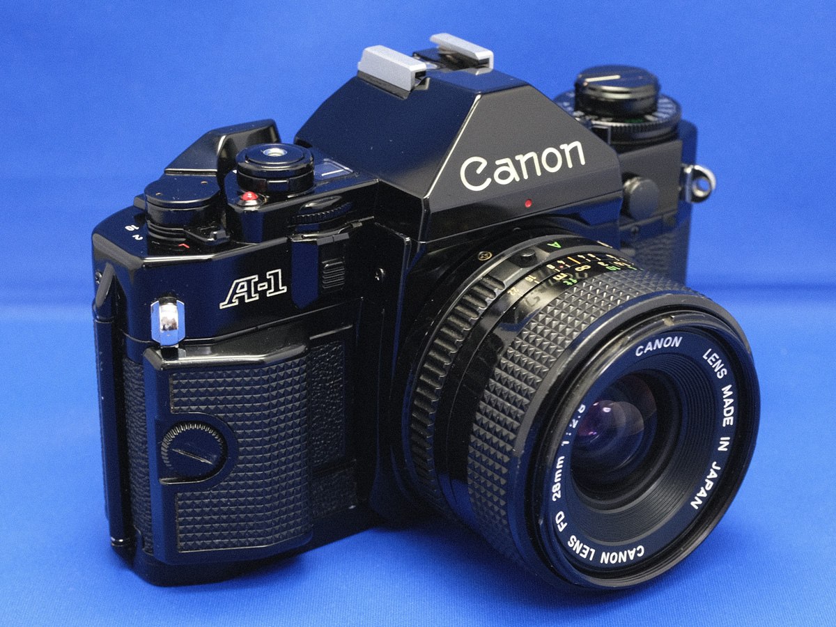 スーパーシューター Canon A-1 - フォト・ディレッタント 即納送料無料 【名機 動作OK フィルムカメラ スーパーシューター】キャノンA-1+単焦点2本 フィルムカメラ