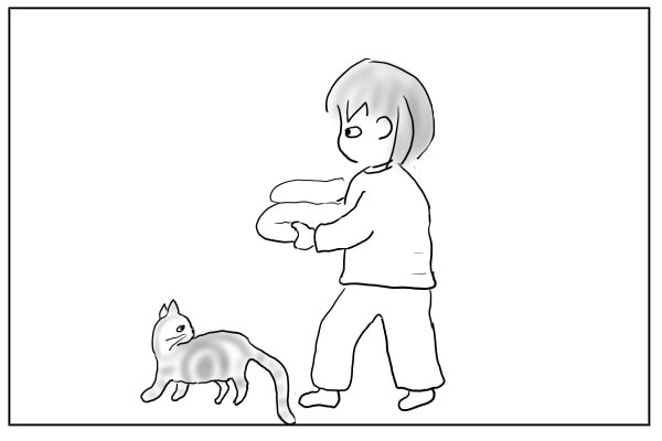 猫と歩く女