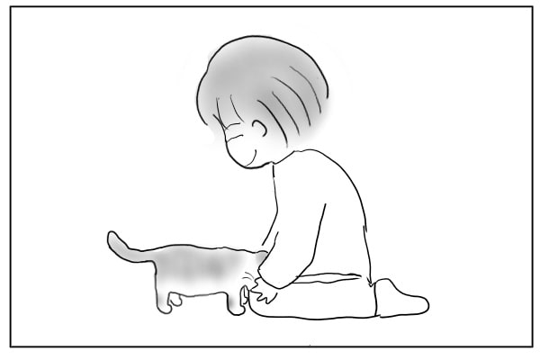 頭を埋める猫