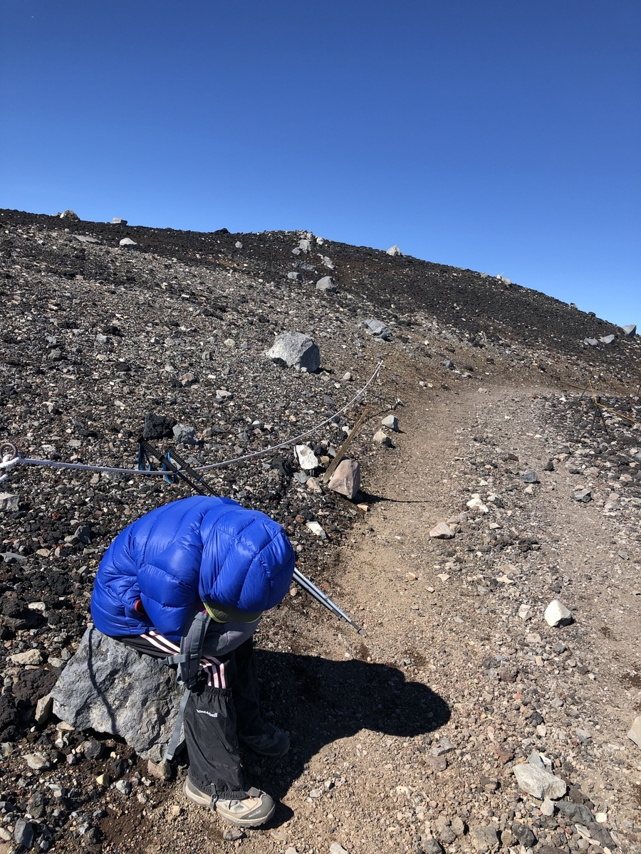 My kid suffering altitude sickness at Mt. Fuji