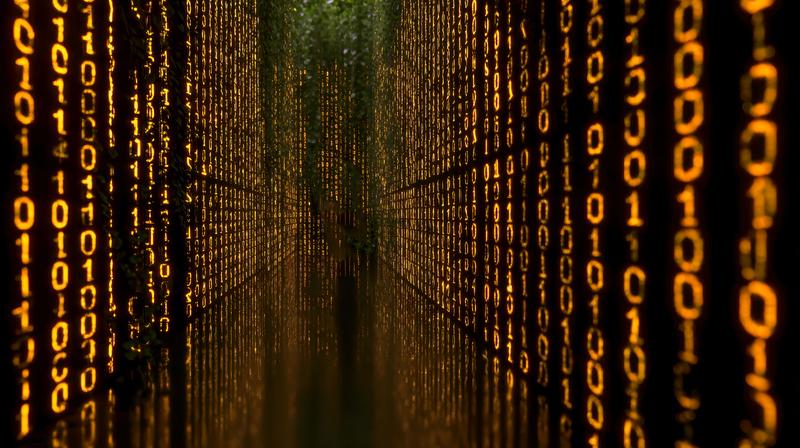 デジタル情報の中枢を象徴するような構図の無料のAI画像。縦に0と1が並んでいる