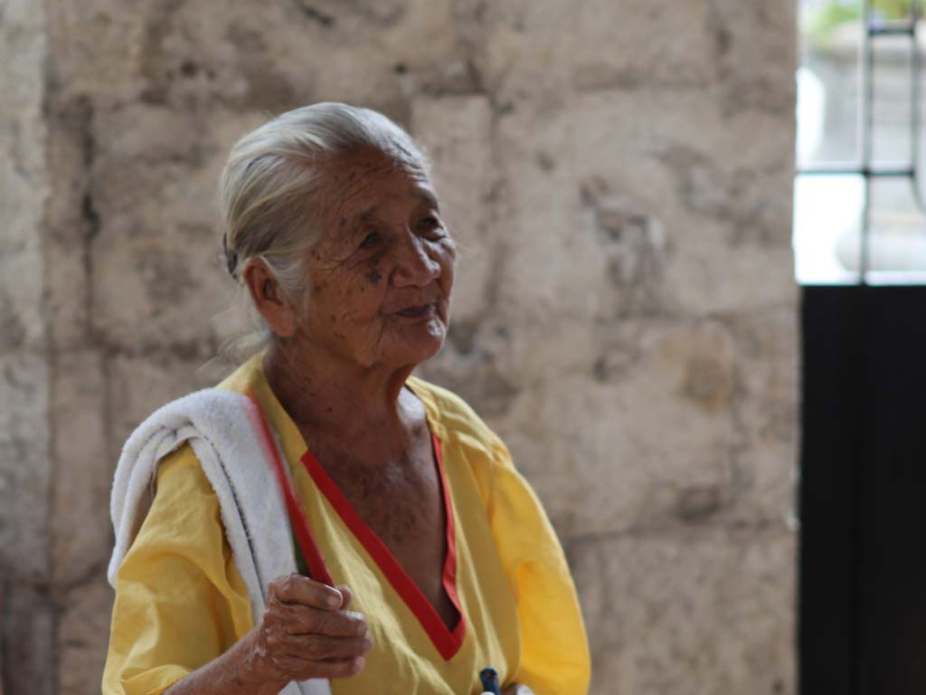 Dancing old women at Magellan Cross
