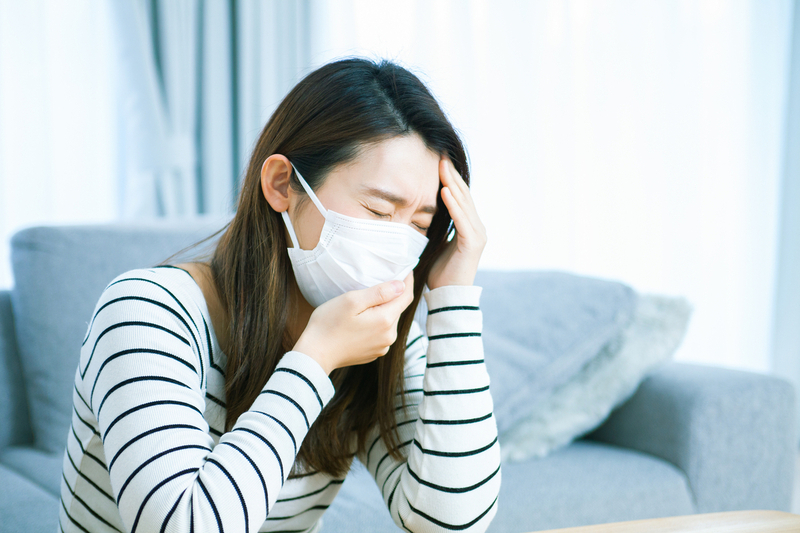 体調不良で会社を休む人の様子