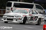 「2009 D1 GP KICK OFF DEMO "QUICK8追走バトル"」 人気No.1！R34型「日産 スカイライン」を駆るノムケンこと野村 謙 選手！[2009東京オートサロンにて]