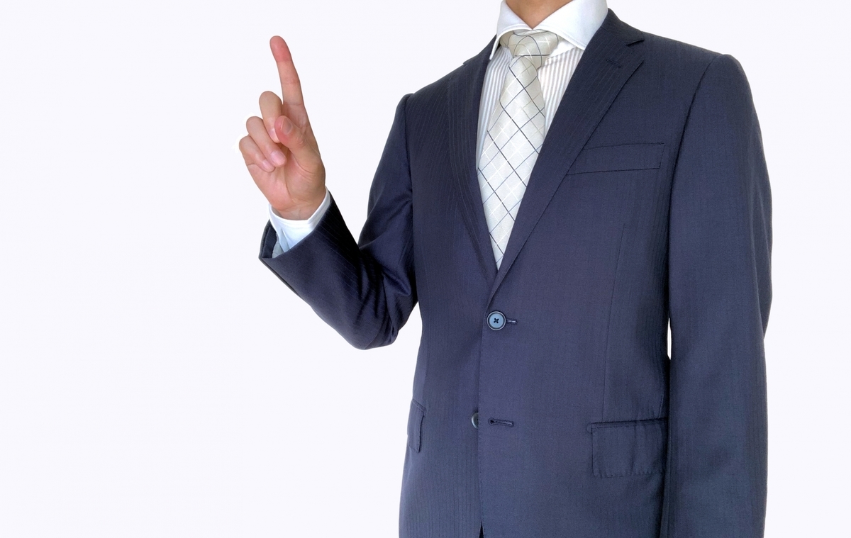 ポイントを示す男性