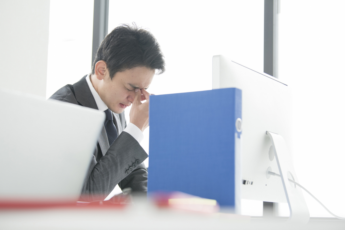 疲れている男性