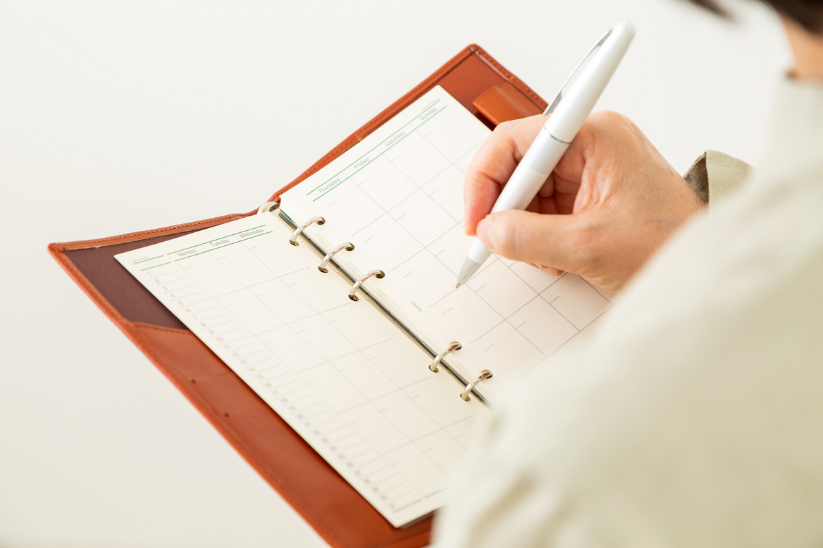 手帳に書き込む