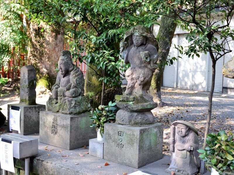 田の神像と恵比須像