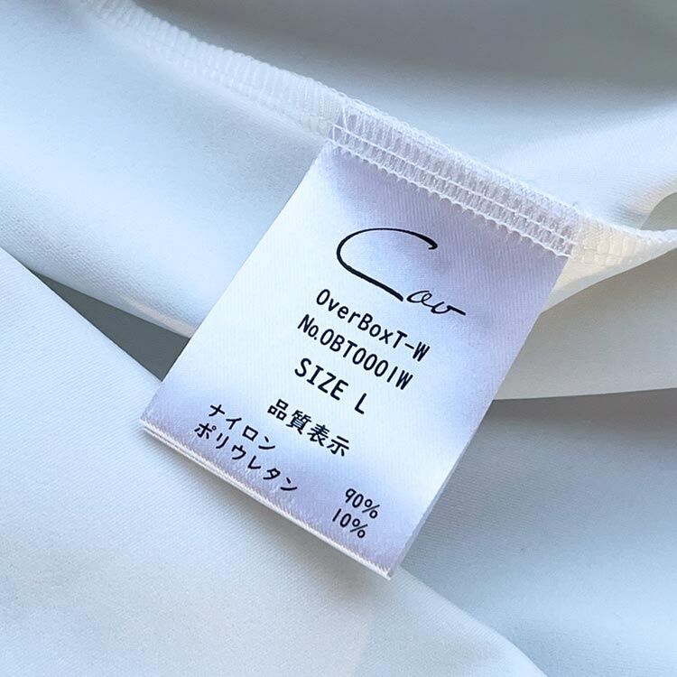 CovのオーバーサイズボックスTシャツの品質表示タグ