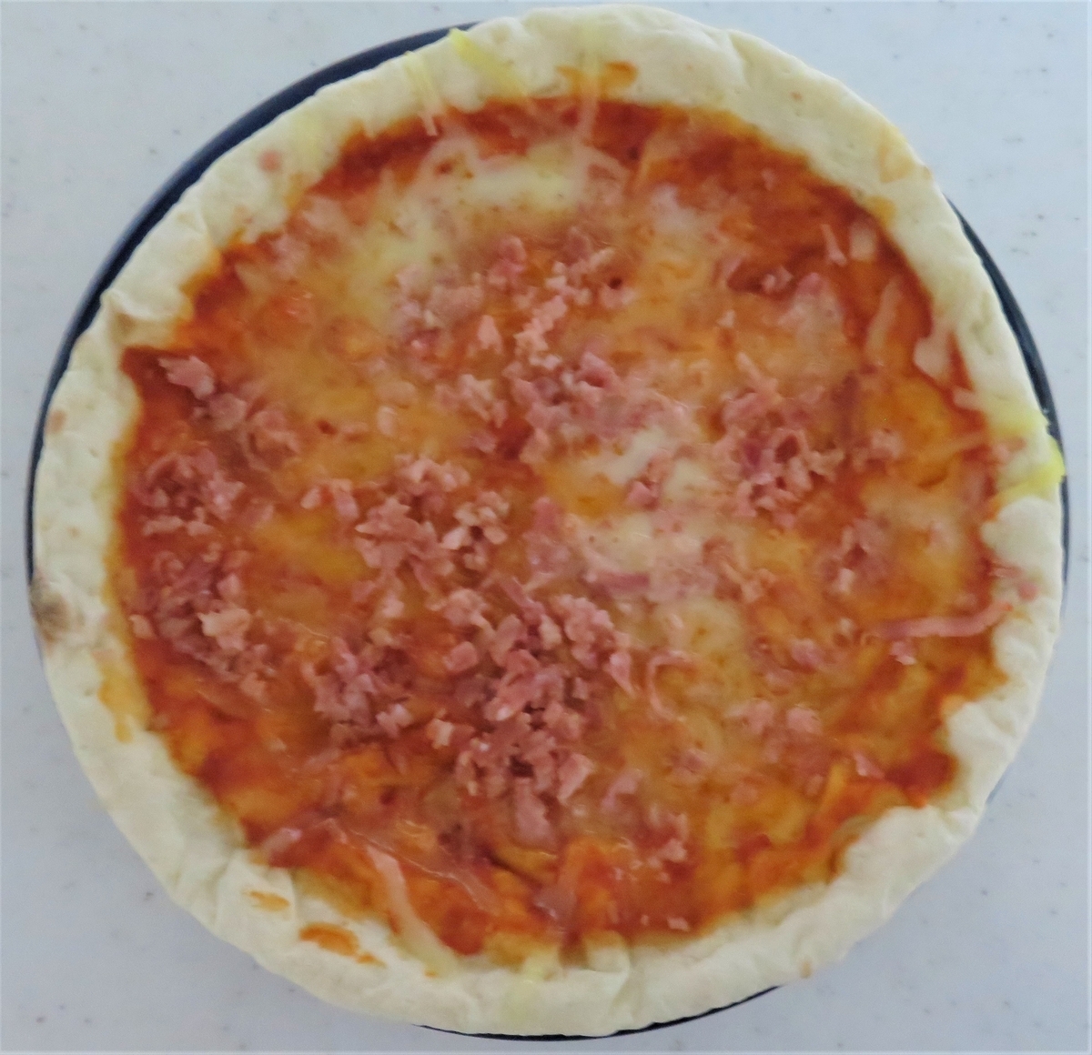 冷凍の「ベーコンピザ」をレンジで温めて食べました‥ - fwssのえっさん