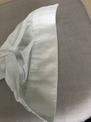 袖口から