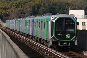 OsakaMetro400系(406-13編成・「夢洲2025」HM付き)