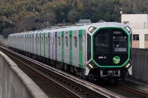 OsakaMetro400系(406-11編成・「夢洲2025」HM付き)