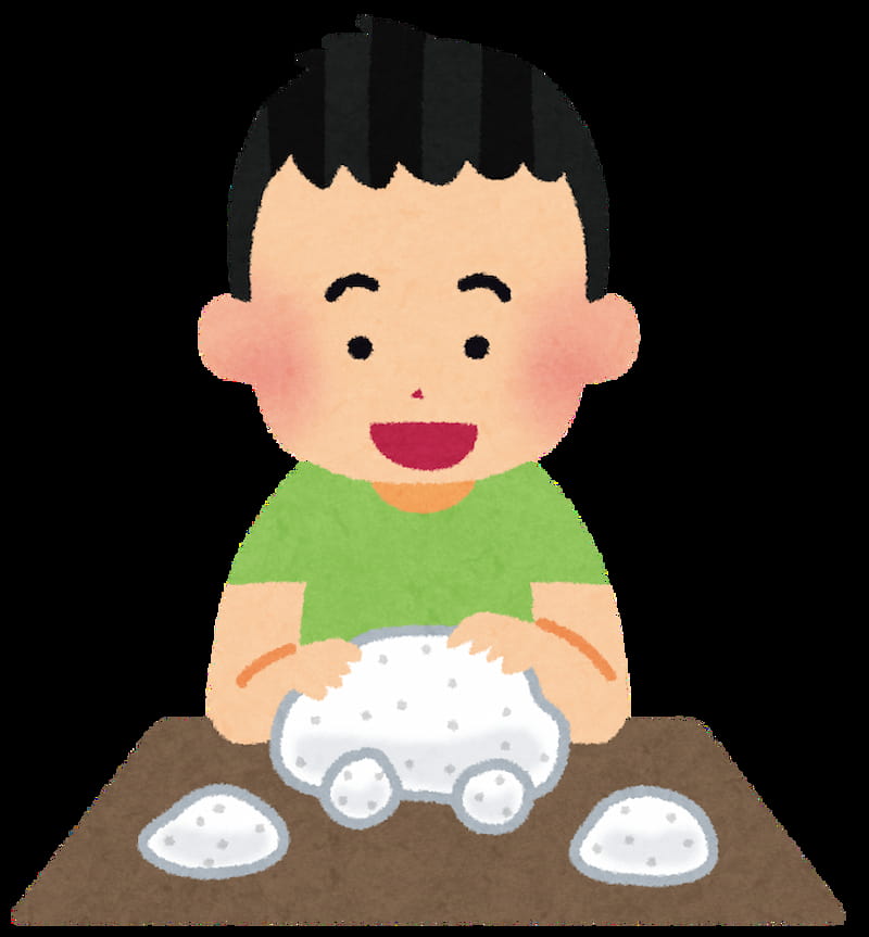粘土を使って感覚遊びをしている2歳半の子ども