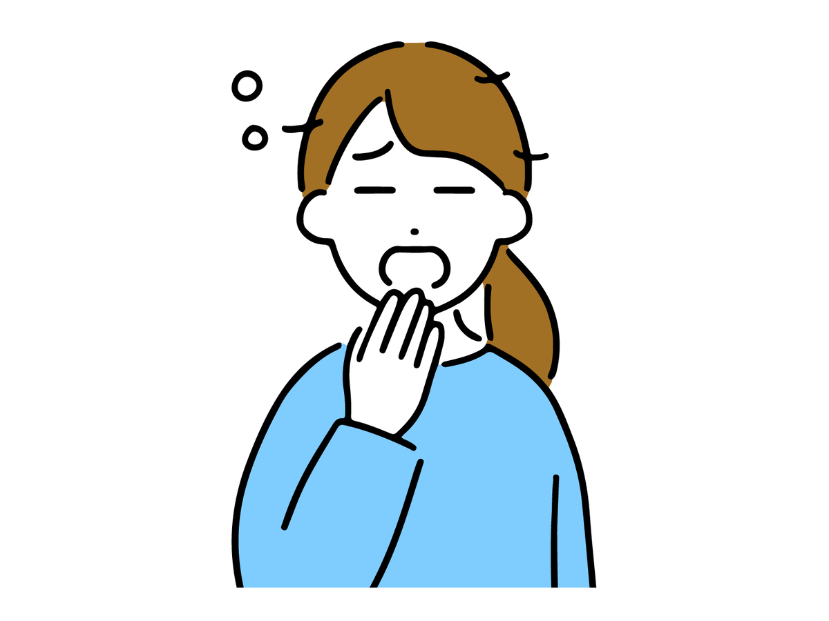 あくびをする女性