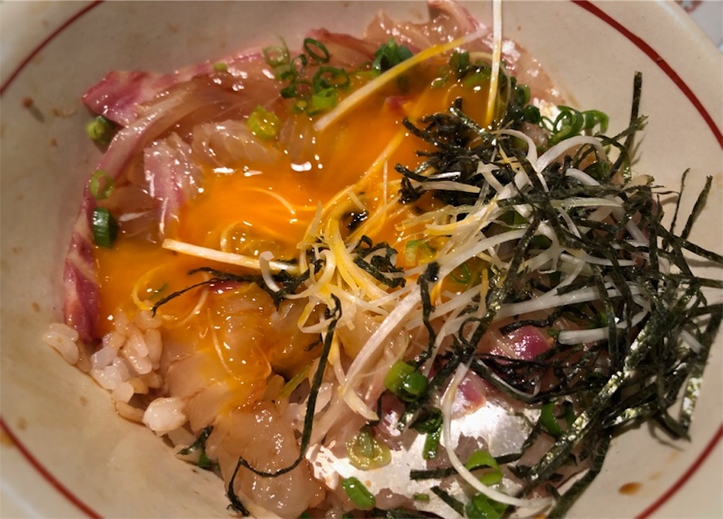 だし醤油と卵黄を絡めた鯛めし