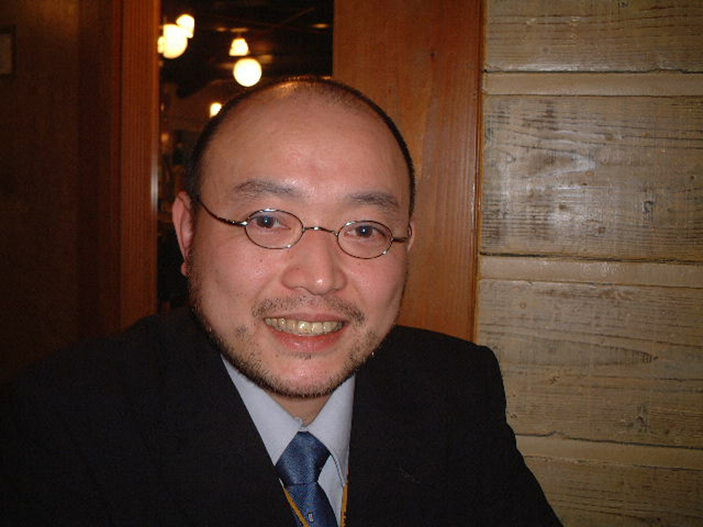 下玉利忠氏