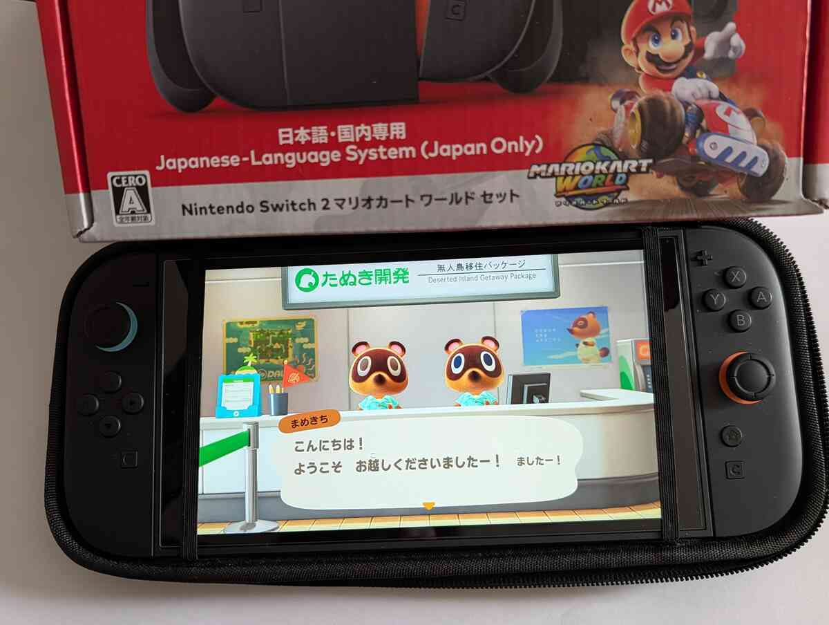 Nintendo Switch 2 box looming over a handheld showing Animal Crossing startup with Timmy & Tommy—new-console adrenaline, cozy nostalgia rush, “I’m finally playing” pure hype moment