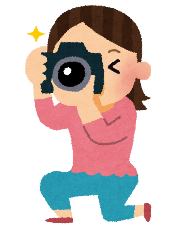 カメラを構える女性のイラスト