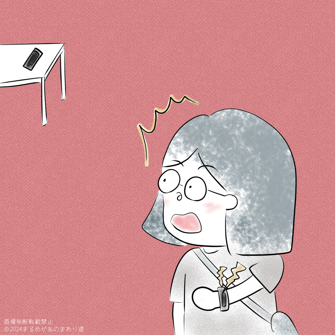 スマートウォッチの通知に気づく主婦