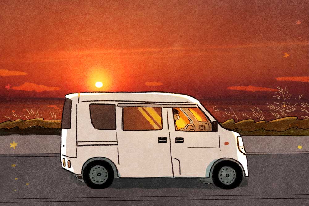 夕日を浴びて走る白くま