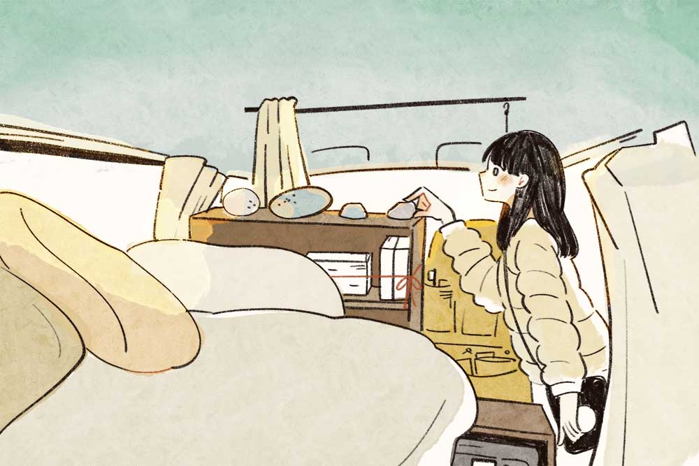 ラベンダービーチで拾った石を、白くま内で並べるいとうさん