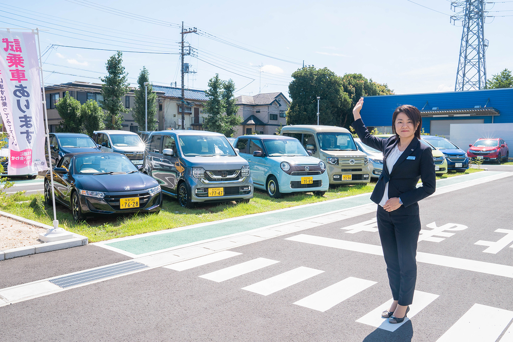 Honda Cars 東京西 さくらモール羽村店の比留間<br>店長。